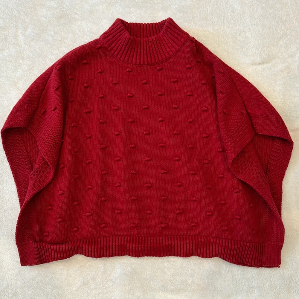 Red cape sweater